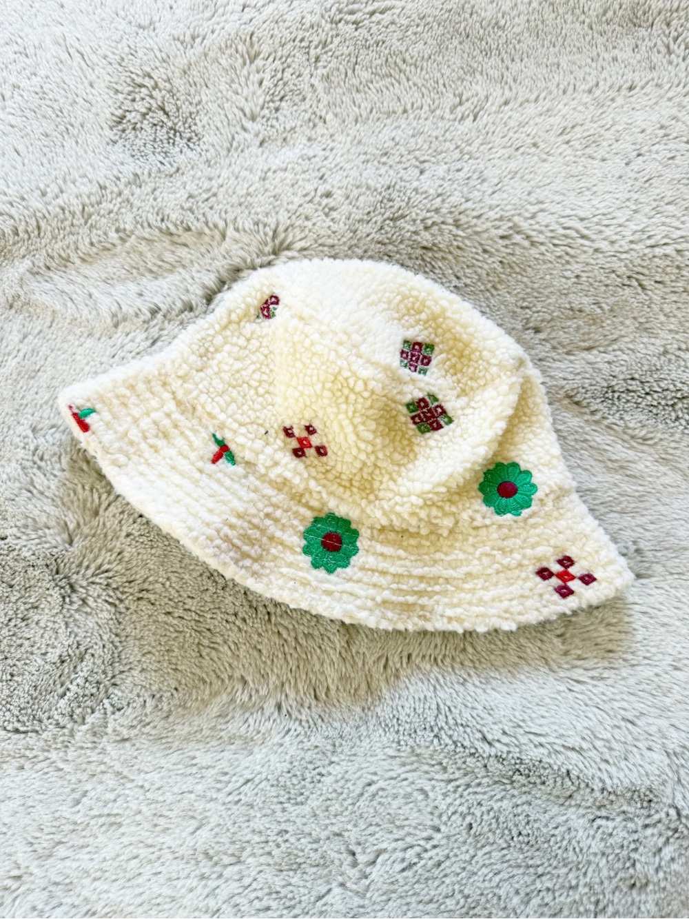 Urban Outfitters Cream Sherpa Bucket Hat with Green & Red Embroidery